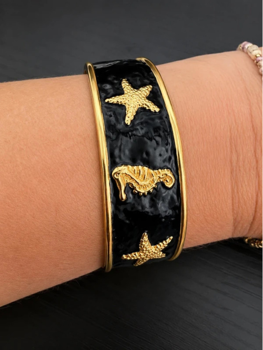 Black and Gold Coastal-Inspired Cuff Bracelet with Starfish and Seahorse Accents